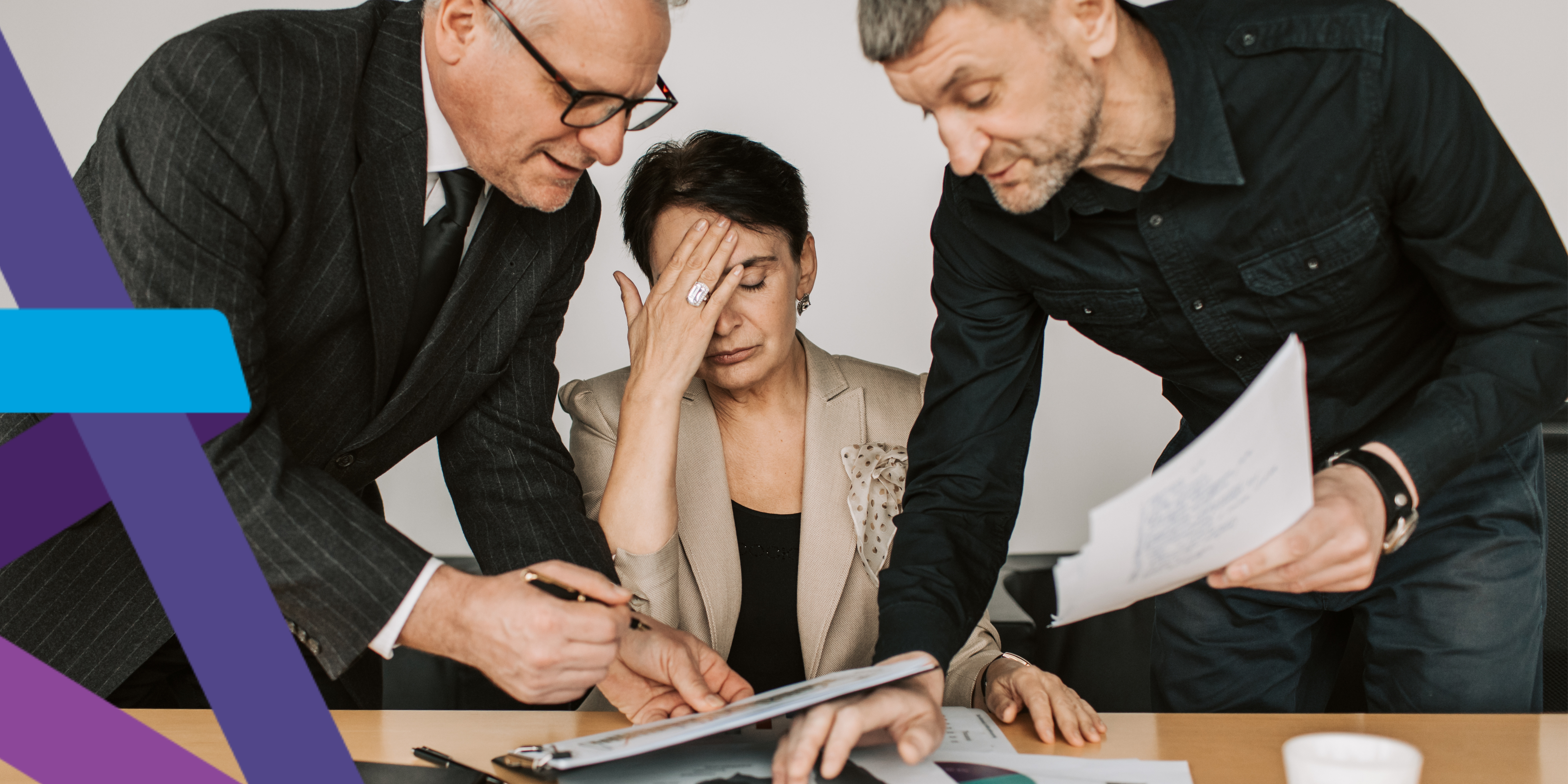 Worried manager struggling with paperwork