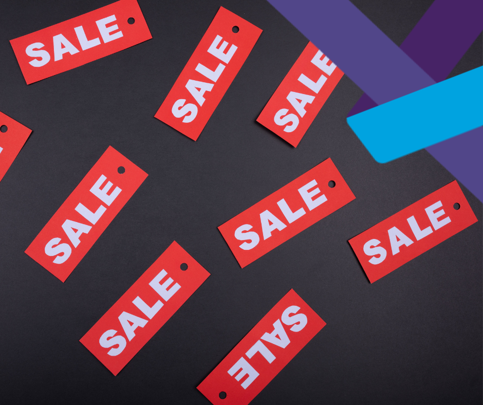 Blog header - Managing crowds in Retail Red "sale" labels on a black background