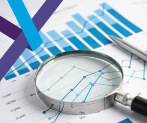 Blog header image for HSE Fatalities statistics 2026. Image is a white background with a report on a table, the report shows graphs and trends,. On top of the report there is a magnifying glass.